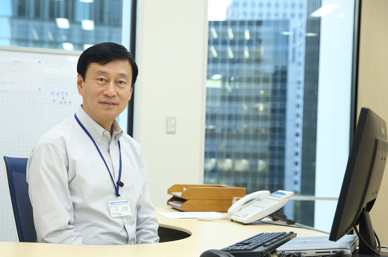 Zhan Yu sitting at his desk