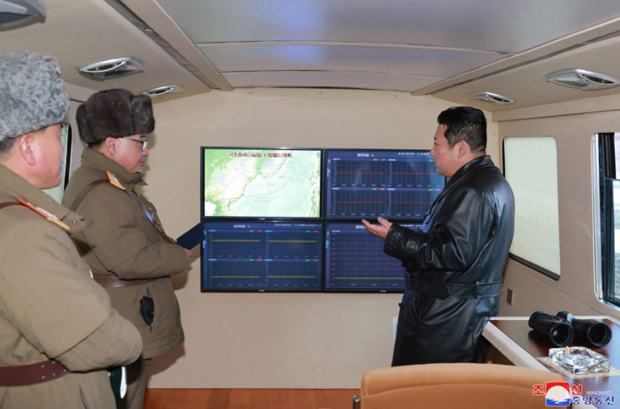 Kim Jong-un views a monitor showing the trajectory of the January 11 missile, which turned sharply northward in mid-flight. (KCNA)