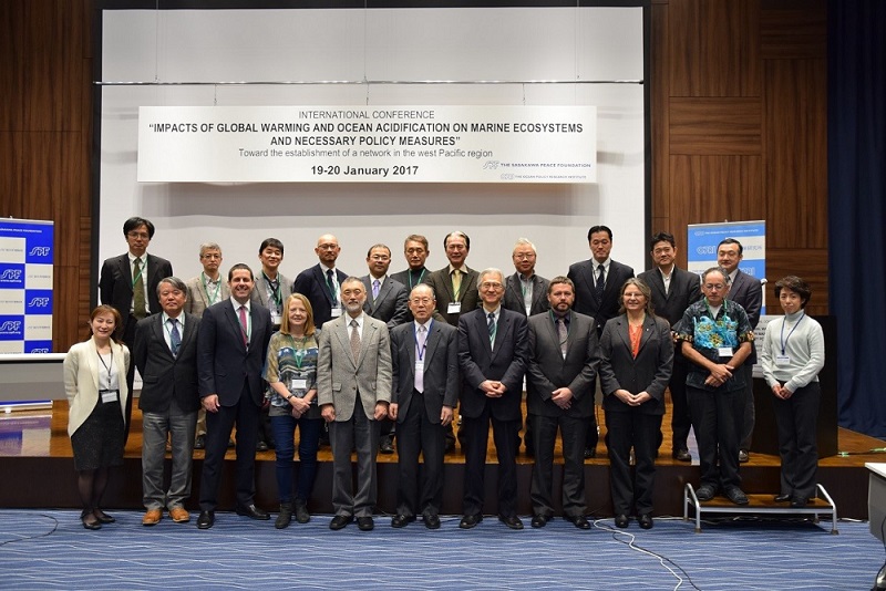 Group photo of the presenters, discussion moderators, and OPRI-SPF researchers at the conference.